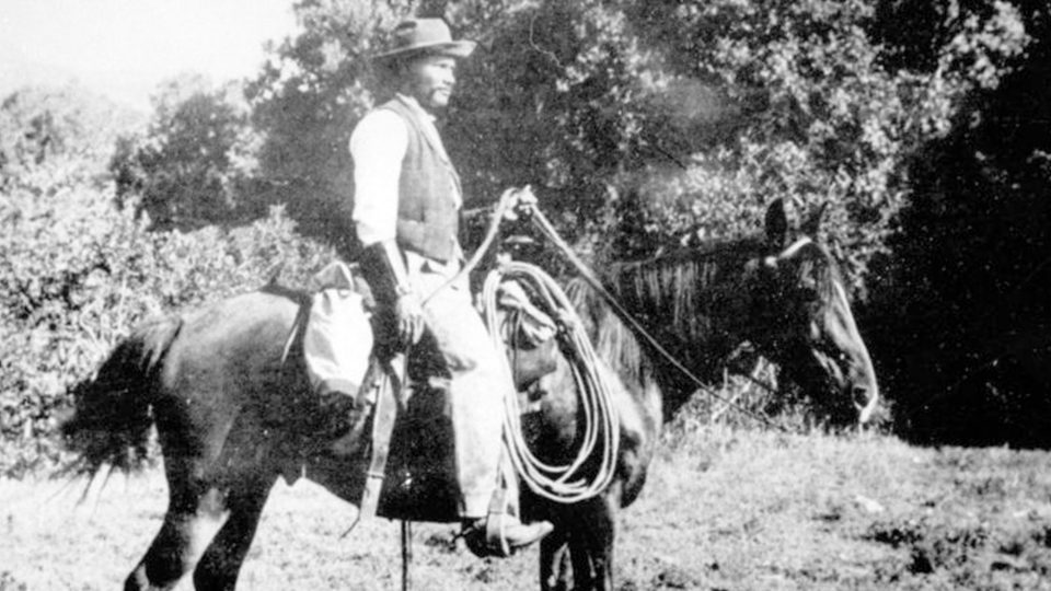 Man of horse black and white image