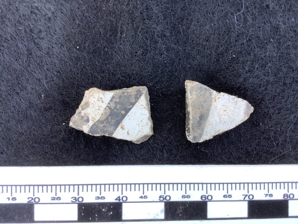 Black on white ceramic sherds exterior