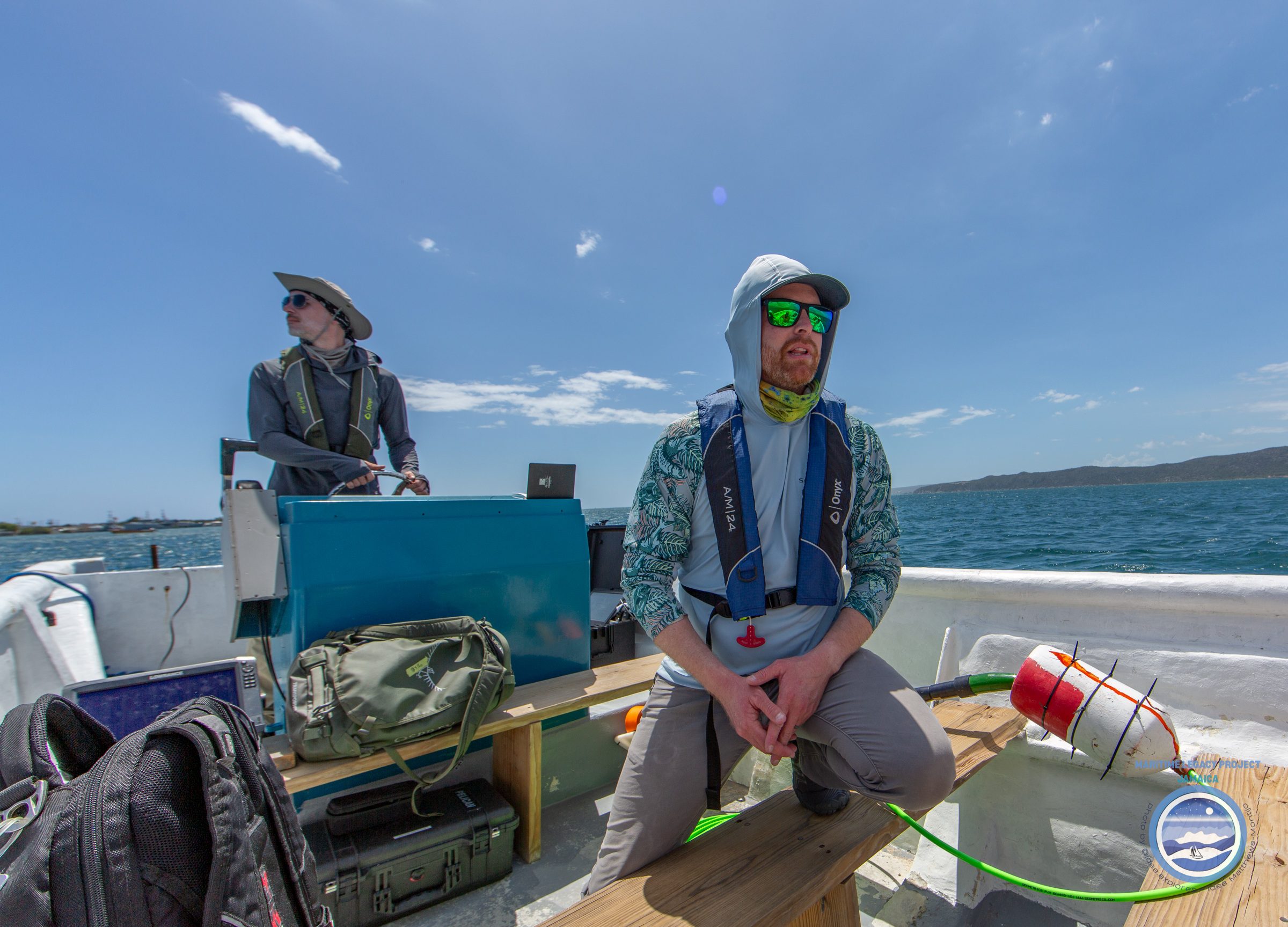 On the Water Matt Hanks (right), Senior Maritime Archaeologist, and William Wilson (left), Faculty Research Associate at the University of West Florida, on their way to the survey area for remote-sensing data acquisition. Photo courtesy of Idee Matthews-Montijo